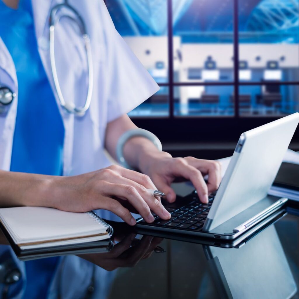 healthcare professional typing